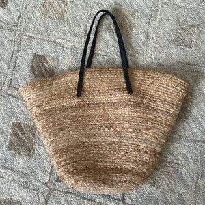 MNG Mango straw beach bag with black faux leather straps in Natural